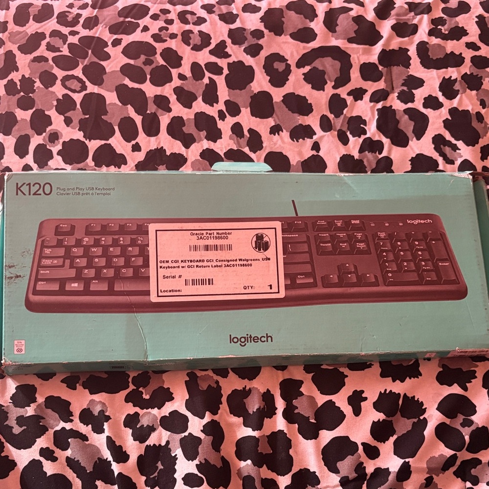 Logitech K120 Keyboard in Black and Teal Box